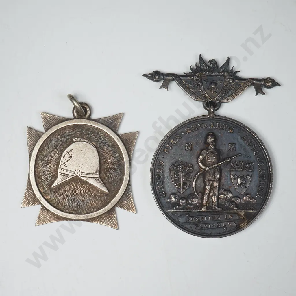 NZ United Fire Brigades Association Five Years Long Service Medal Presented To “FIREMAN F. PURCELL BY THE WANGANUI BOROUGH COUNCIL, 1883”. ( Maker A. Teutenberg, Auckland ) Plus A Large Handmade Sterling Silver Fire Prize Medal With Five Names Engraved On The Back Including “F PURCELL”.  22528 Image 1++