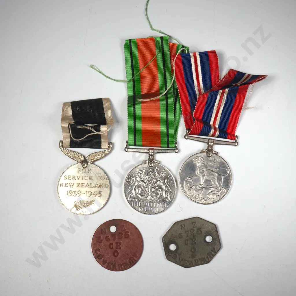 3 X WWII Medals Plus Two Leather Dog Tags Named “NZ 46725 CE O C D YEARBURY”. Image 1++