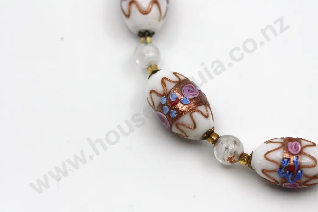 String of Venetian Glass Beads in Opalescent White with Hand Applied nNovel Decorations & Bronze Dust Accents" Image 1++
