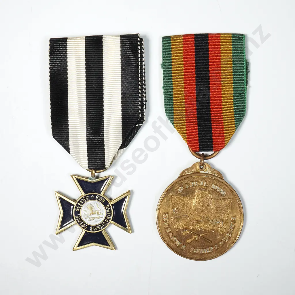 Rhodesia Distinguished Police Service Medal & Awarded Zimbabwe Independence Medal Image 1++