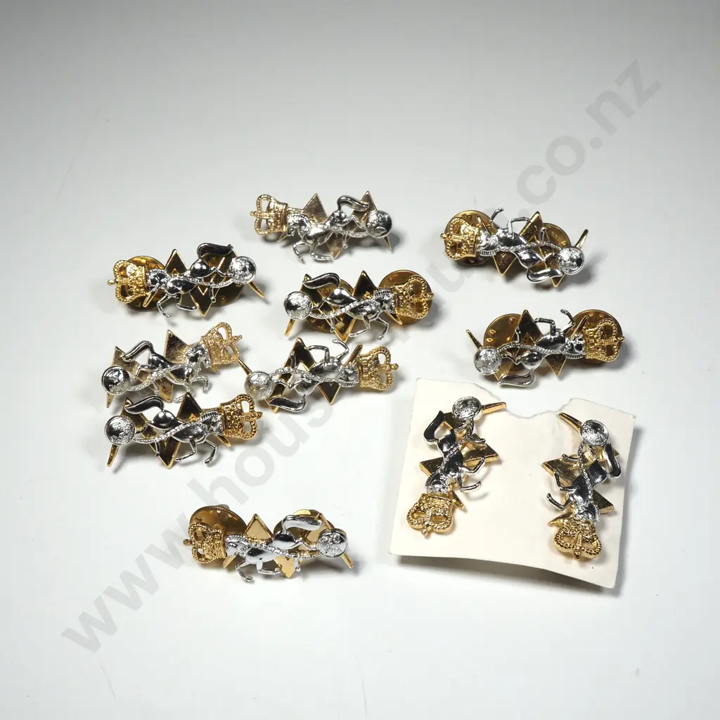 Assorted lot of Anodised NZ Military Collar Badges Image 1++