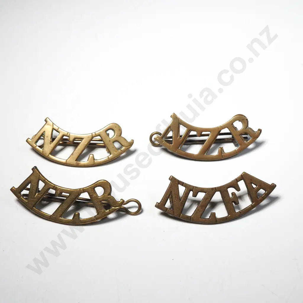 Four Brass New Zealand Shoulder Titles  Image 1++