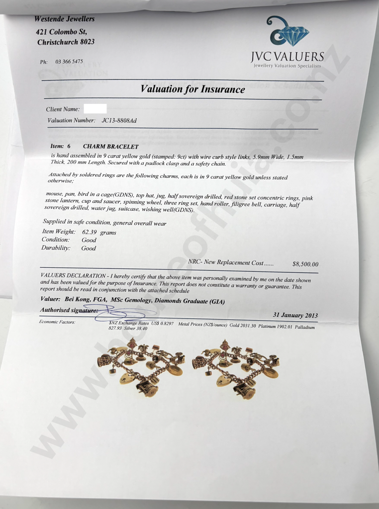 Substantial 9ct Gold Charm Bracelet Image 1++