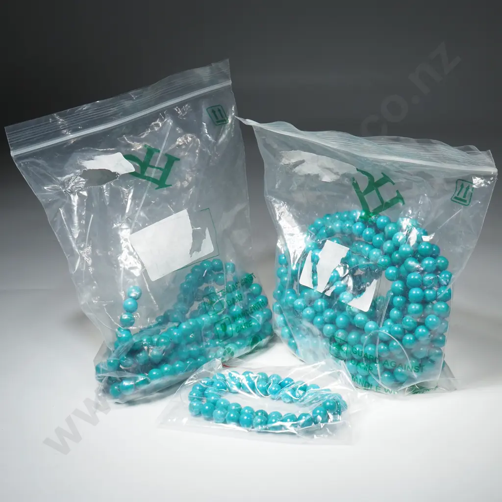 Large Quantity of Synthetic Turquoise Strung Beads Image 1++