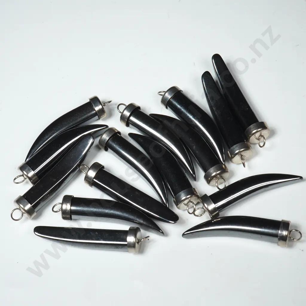 Quantity of Hematite Tooth Shaped Cross Pendants Image 1++