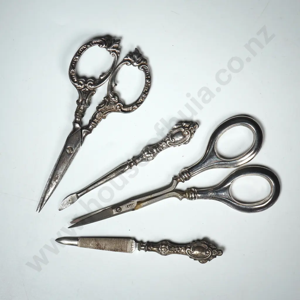 Four Sterling Silver Handled Nail Tools Image 1++