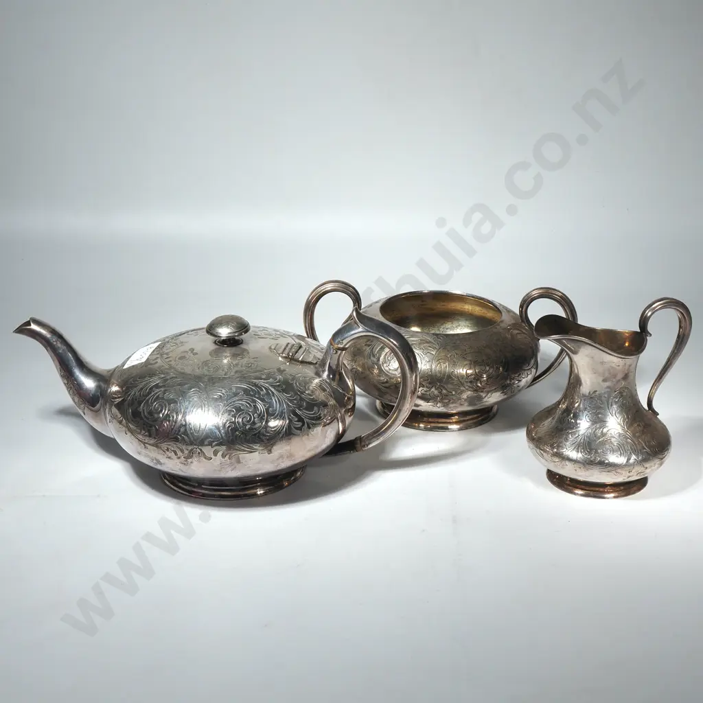 Three Piece Silver Plate Tea Set w Allover Engraved Decoration Image 1++