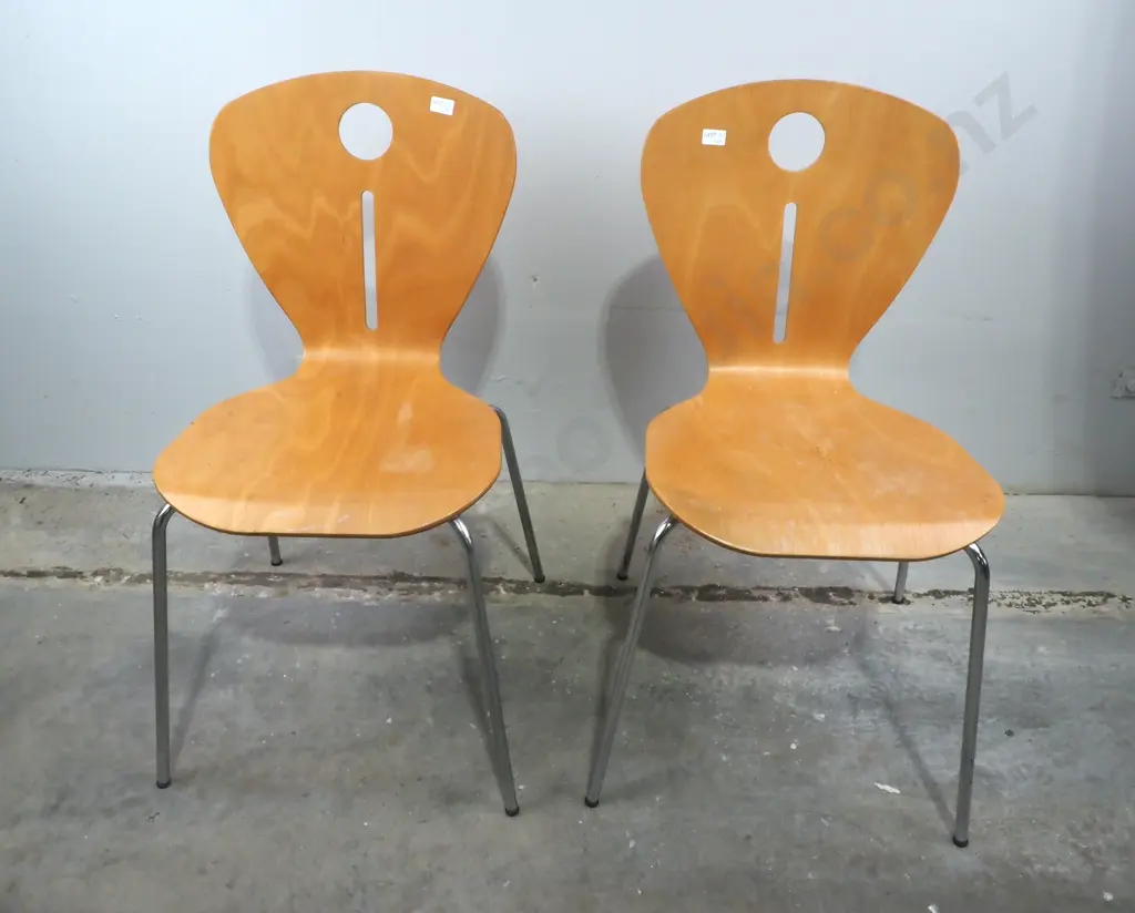 Two Molded Plywood Chairs w Keyhole Cutouts Image 1++