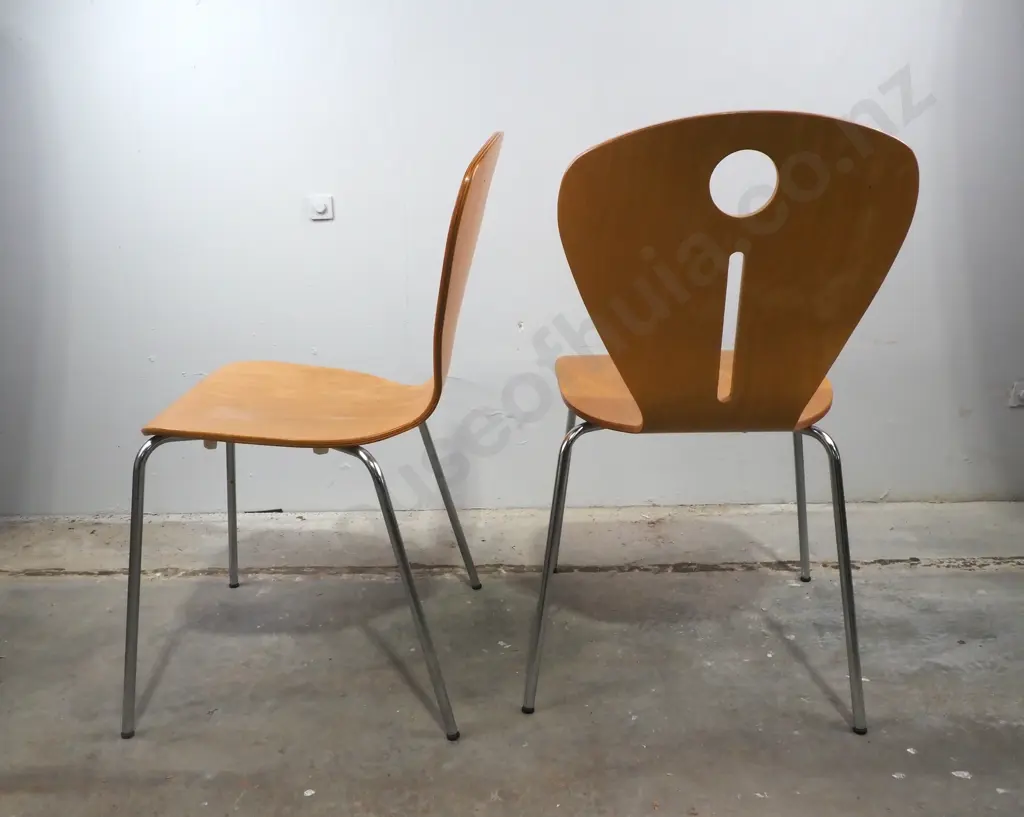 Two Molded Plywood Chairs w Keyhole Cutouts Image 1++
