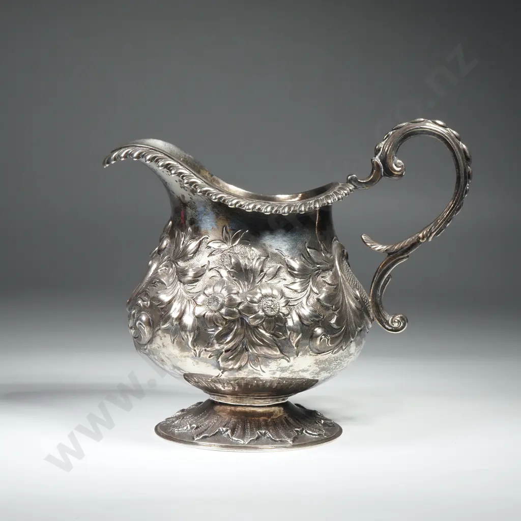 Georgian Sterling Silver Embossed Milk Jug. London 1785v Image 1++