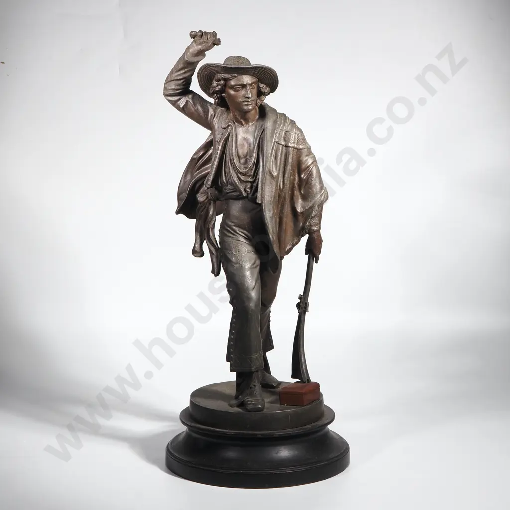 Vintage Spelter Figure Depicting A Gaucho Holding a Gun on a Round Wooden Base Image 1++