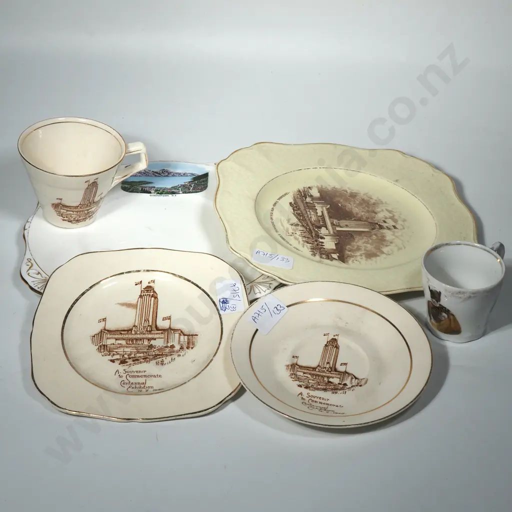 Assorted Lot of Souvenir Items incl Plates, a Trio, Teaspoons & a Cup Featuring a Maori Warrior Image 1++