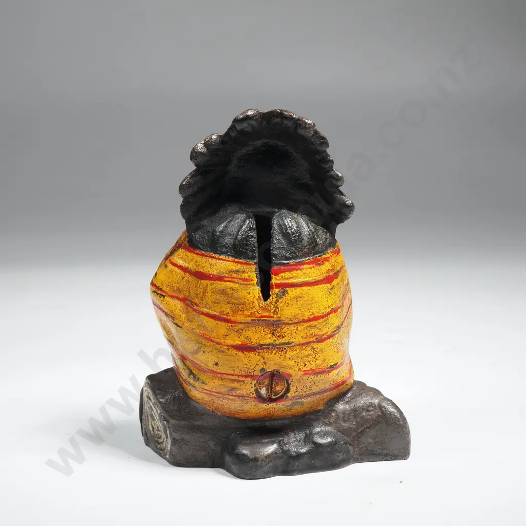 Small Cast Iron Money Bank in the form of a Seated Indian Image 1++