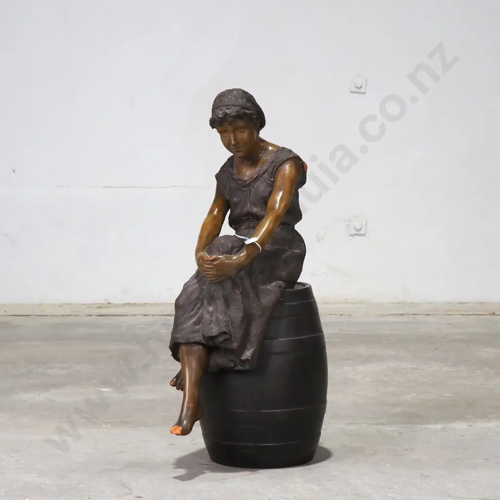 Terracotta Figure of a Young Girl Seated  on a Barrel Image 1++