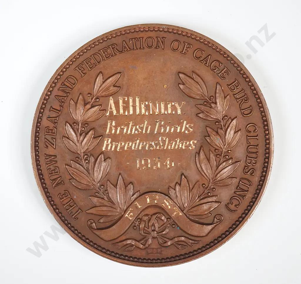 Copper medal “THE NEW ZEALAND FEDERATION OF CAGE BIRD CLUBS ( INC )”, engraved “A. E. HENLEY / BRITISH BIRDS / BREEDERS STAKES / 1934 / FIRST”, 48mm Image 1++
