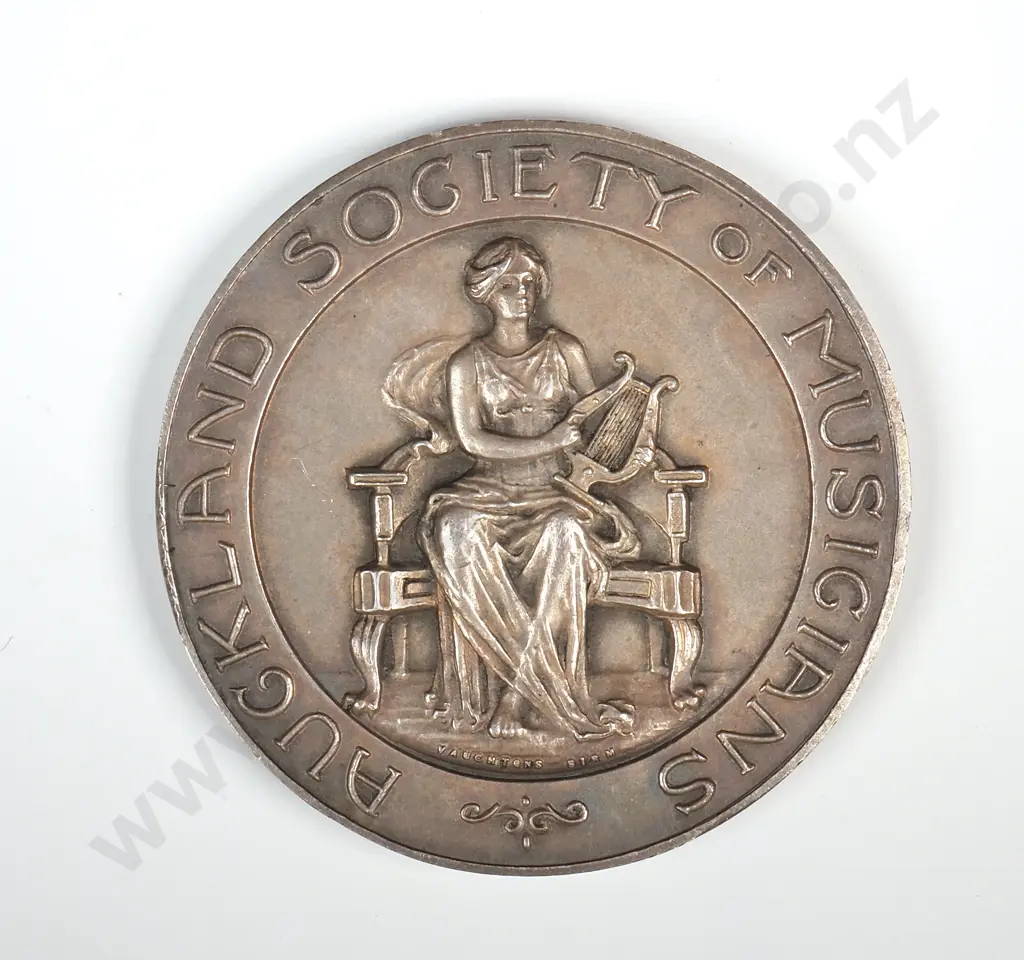 Antique sterling silver medal “AUCKLAND SOCIETY OF MUSICIANS”, “AWARDED TO”, engraved “EVAN MacCORMICK / 1ST / DUET / ( GENTLEMEN )”, 36mm, 29.5 grams, hallmarked Birmingham 1912 Image 1++