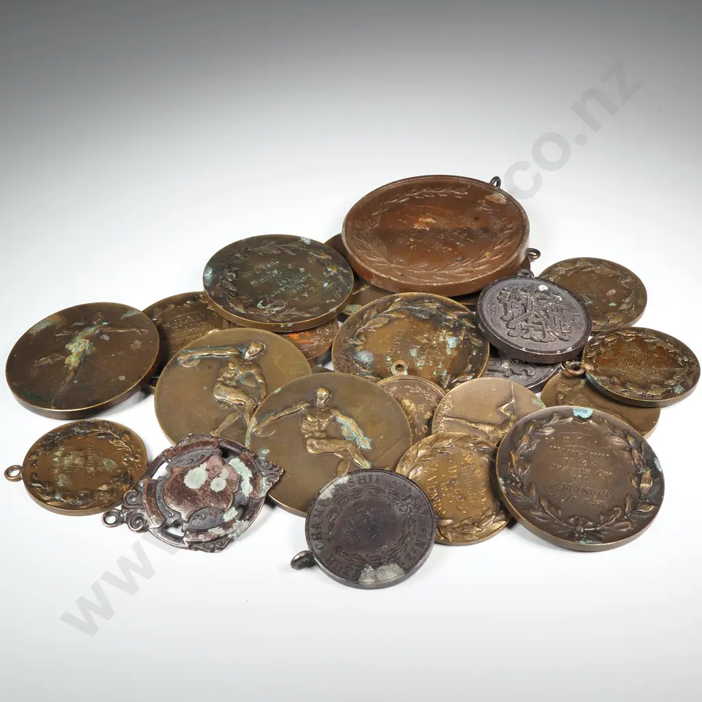 23 x copper, bronze and silver athletics prize medals, awarded to “P. MUNRO”, C.1923 to 1935 Image 1++