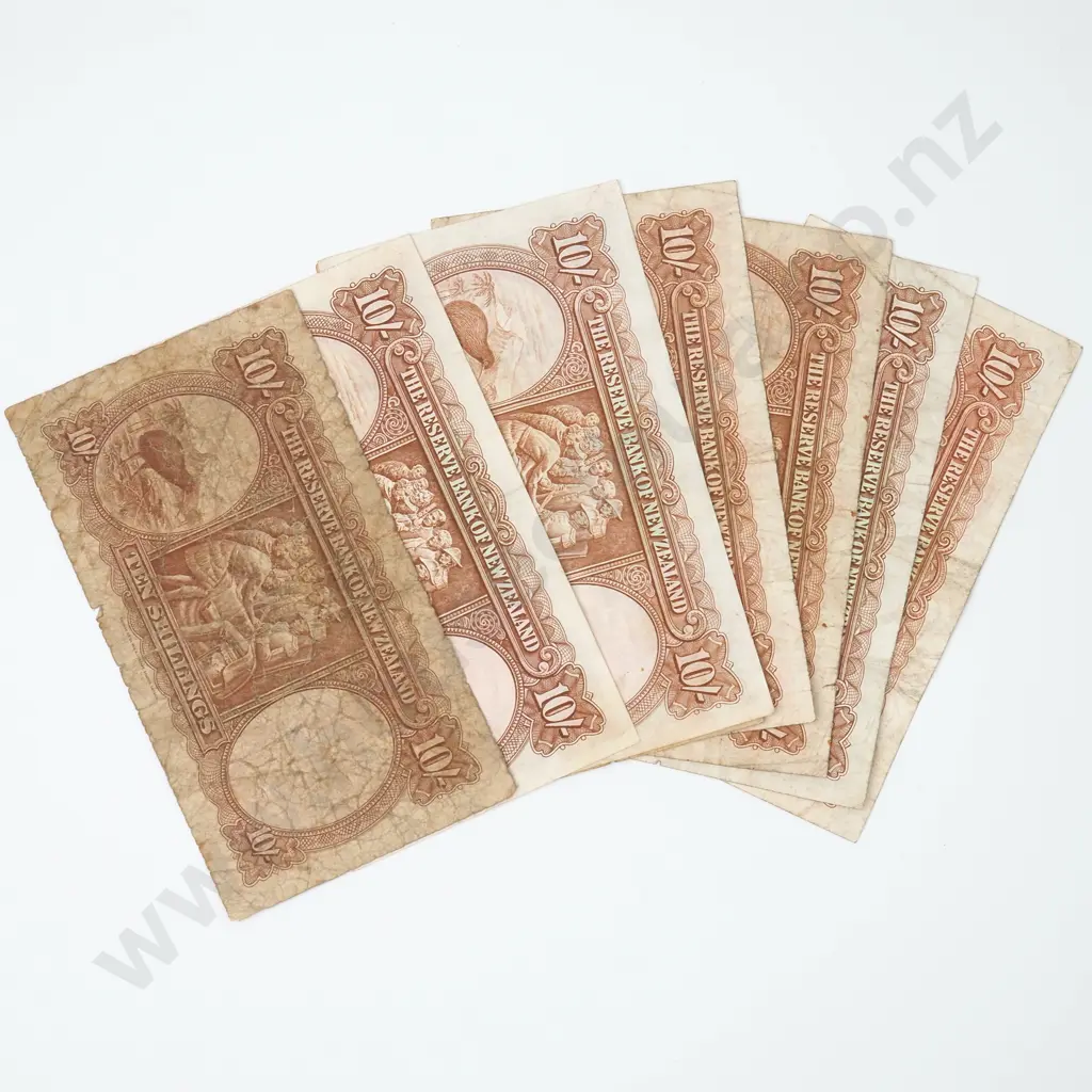 Seven NZ Fleming & One Hanna Ten Shilling Banknotes - Various Prefixes - Circulated Condition Image 1++
