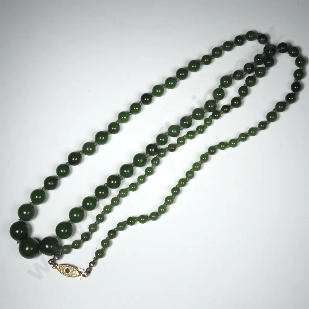 String of Hand Knotted Graduated Greenstone Beads Image 1++