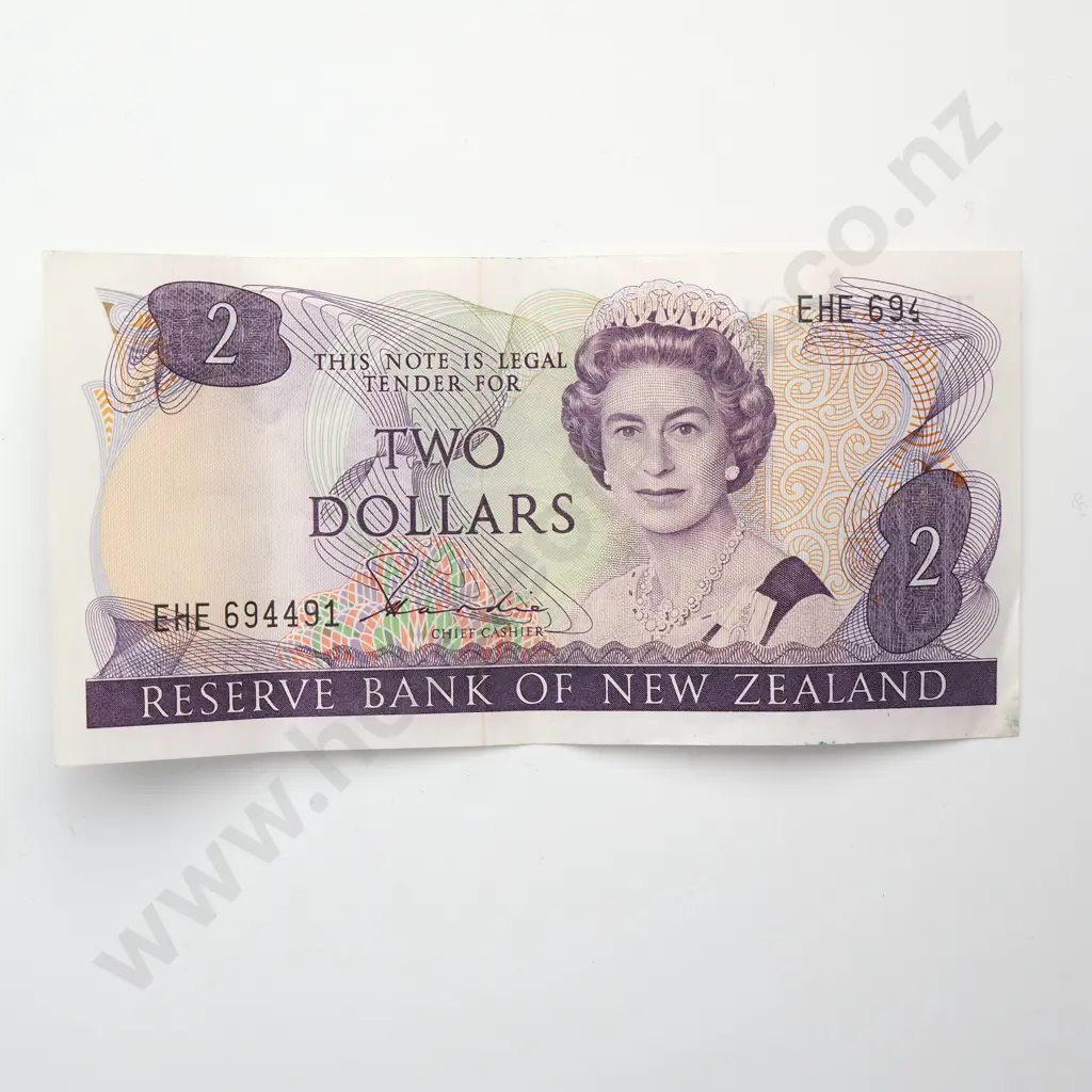 2 DOLLARS ERROR NOTE, HARDIE TYPE II SIGNATURE, PREFIX EHE, MISSING THREE AND A HALF NUMBERS TOP RIGHT, EXTREMELY FINE Image 1++