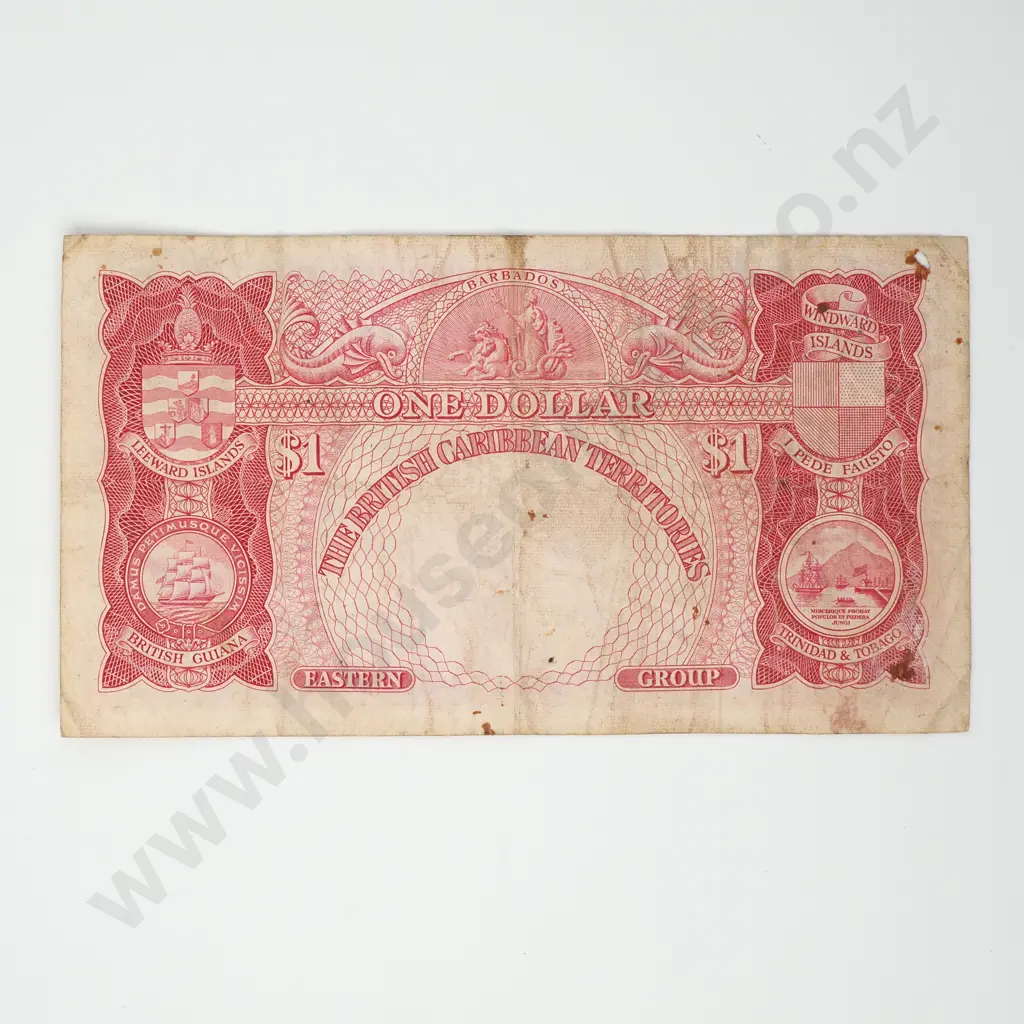 BRITISH CARIBBEAN TERRITORIES 1 dollar (small hole top left) Image 1++