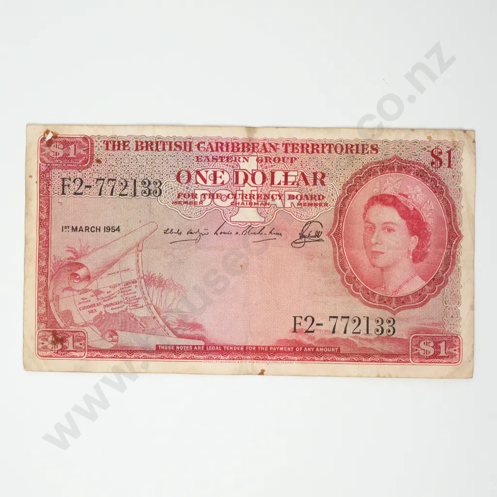 BRITISH CARIBBEAN TERRITORIES 1 dollar (small hole top left) Image 1++