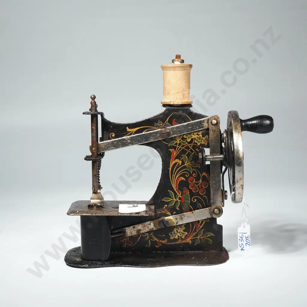 Tin Toy Sewing Machine - Flower Designs & Crank-Handle Image 1++