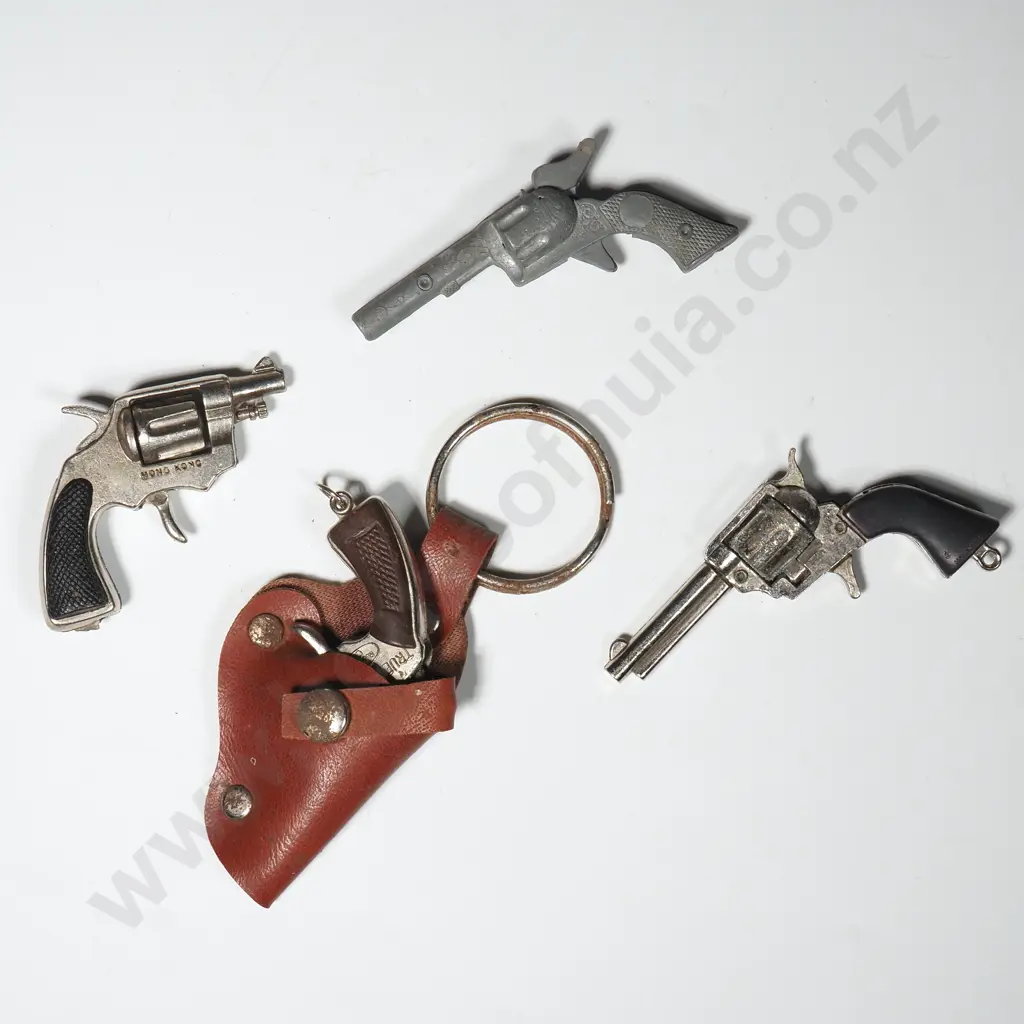 Four Miniature Revolver Key-Ring Sized Guns Image 1++
