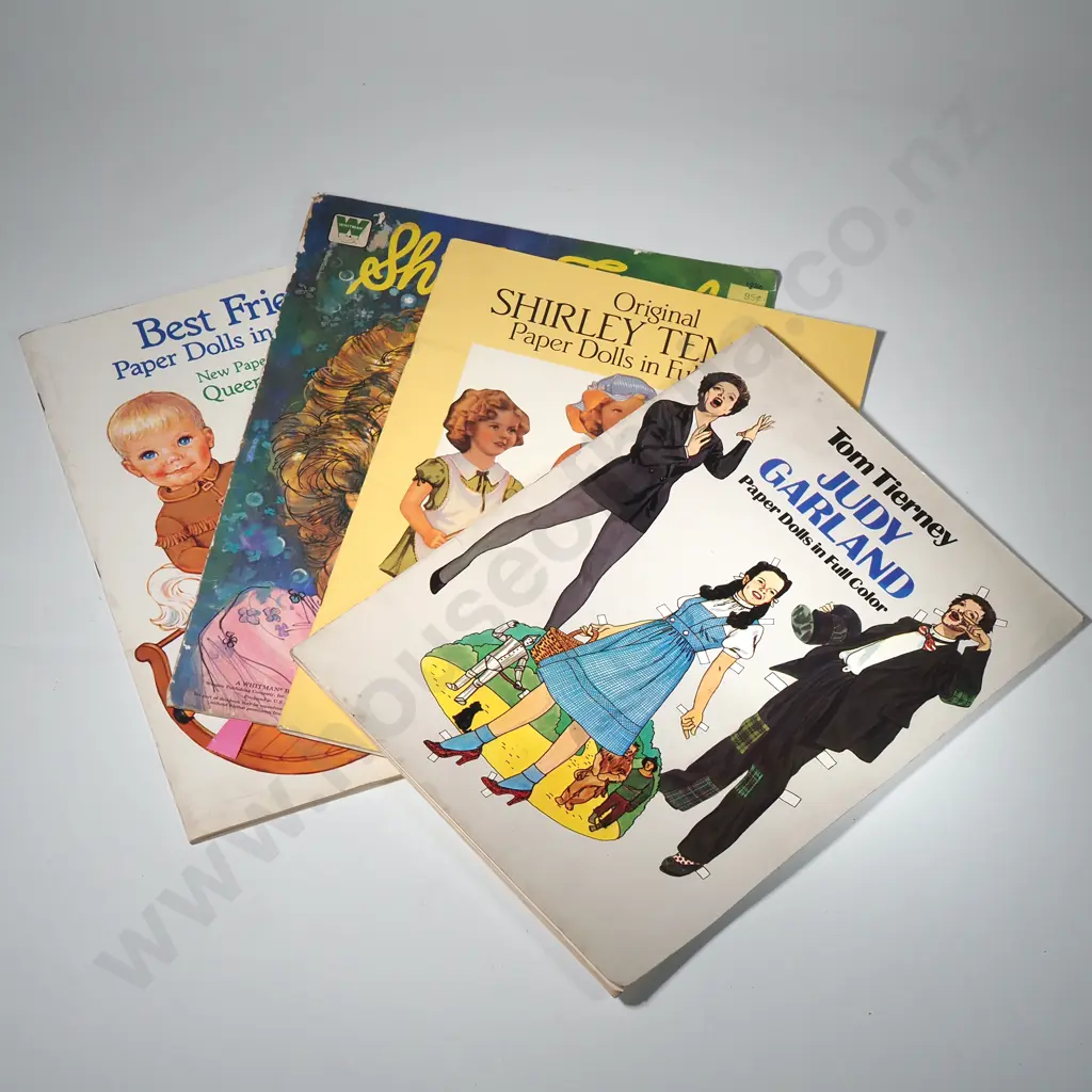 Collection of Four Vintage Paper Doll Books Image 1++