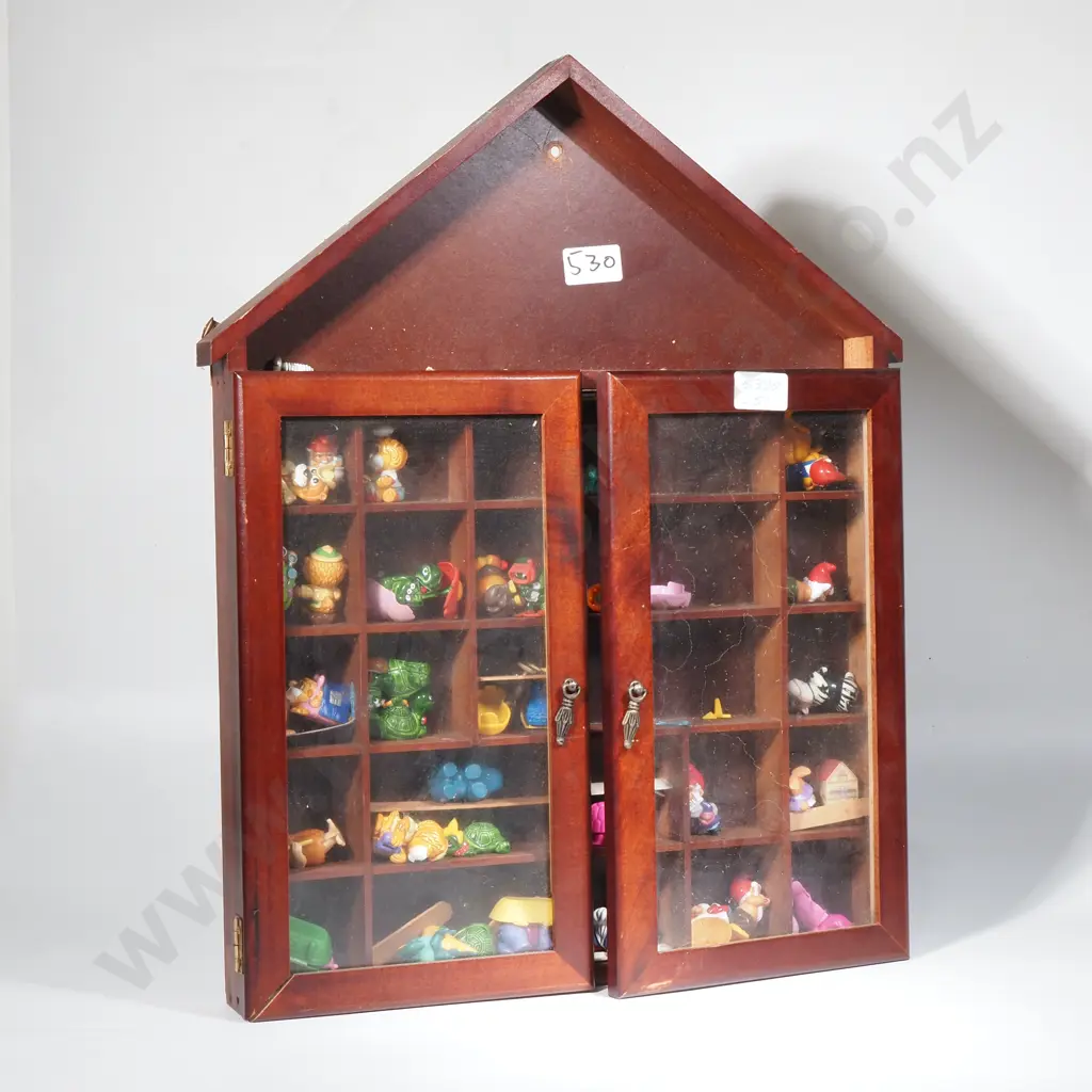 Wooden wall mounted miniature shelving unit with assorted small toys Image 1++