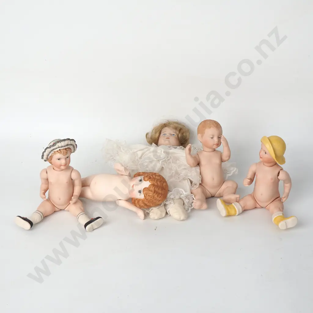 Assorted Reproduction Bisque Miniature Dolls Image 1++