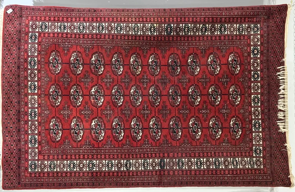 Hand Knotted Bokhara Rug w Elephant Feet Patterms on a Dark Red Ground Image 1++