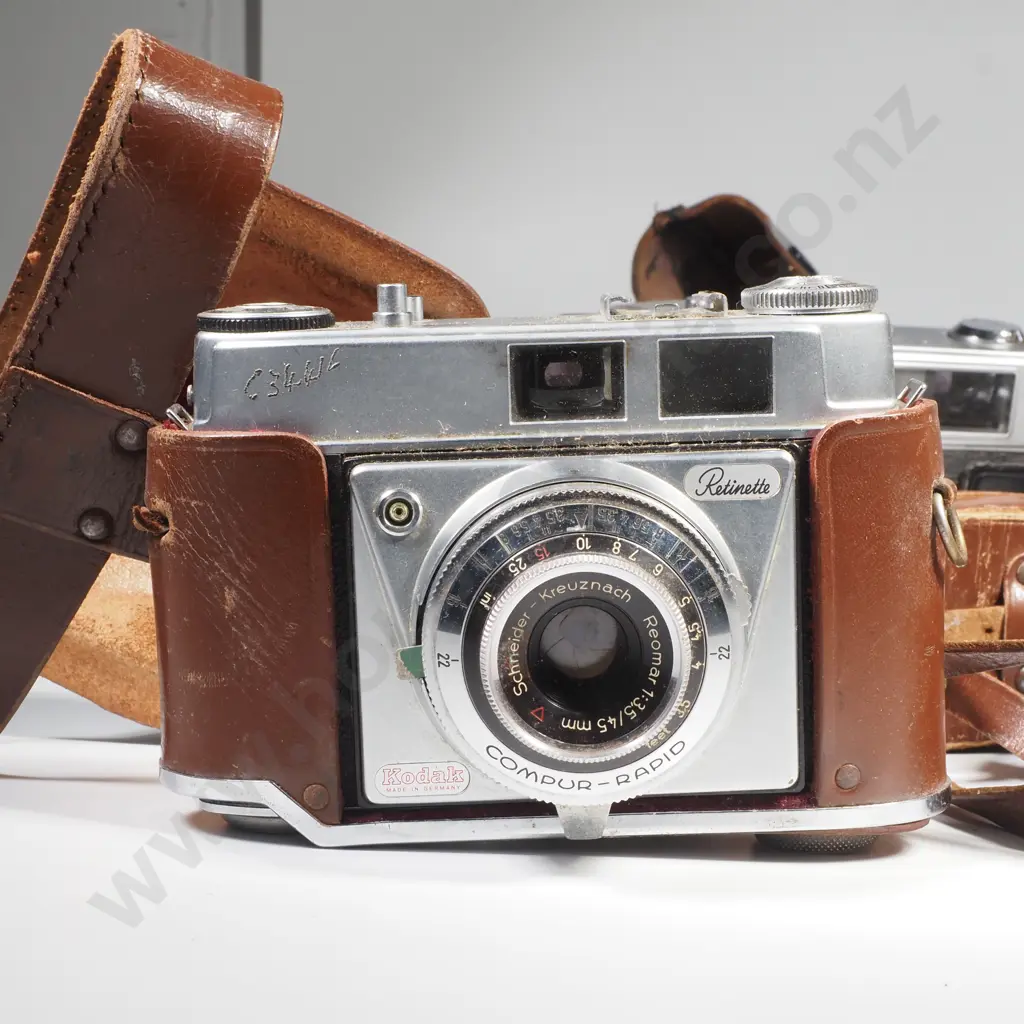 Four Vintage Cameras in Cases Image 1++