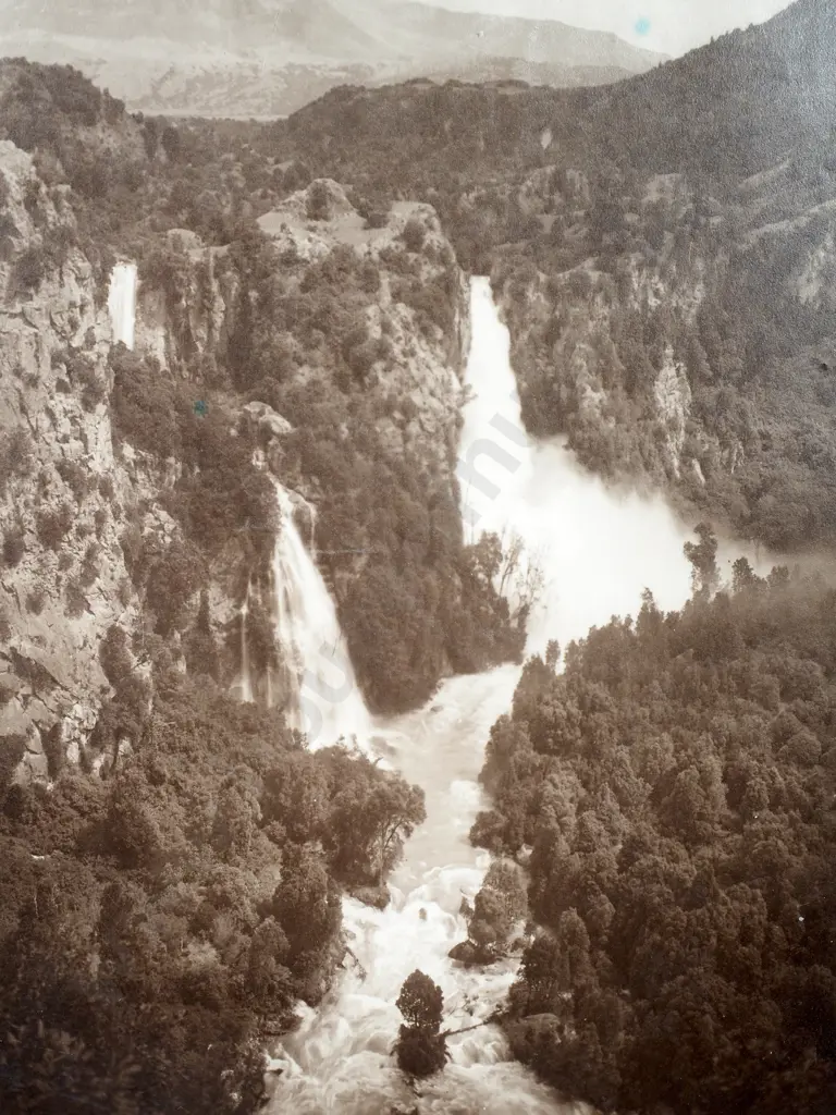 Two Steep Waterfalls Merging into a River - Photograph Image 1++