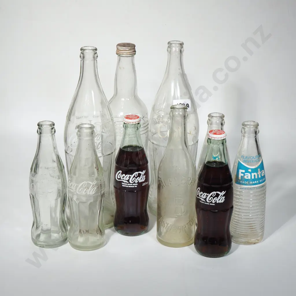 Collection of Vintage Coke & Fanta Bottles, a Burnetts White Satin Gin Bottle & An Alfred Bray Ashburton Cordial Bottle Image 1++