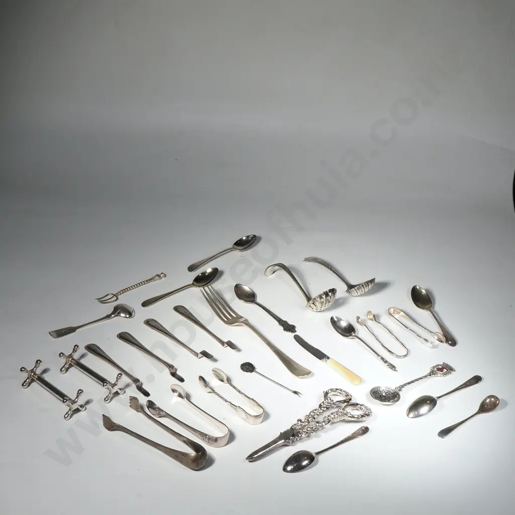 Collection of Silver Plated Cutlery including Sugar Tongs, Butter Knife, Teaspoons, Grapes Scissors & Sifting Spoon Image 1++