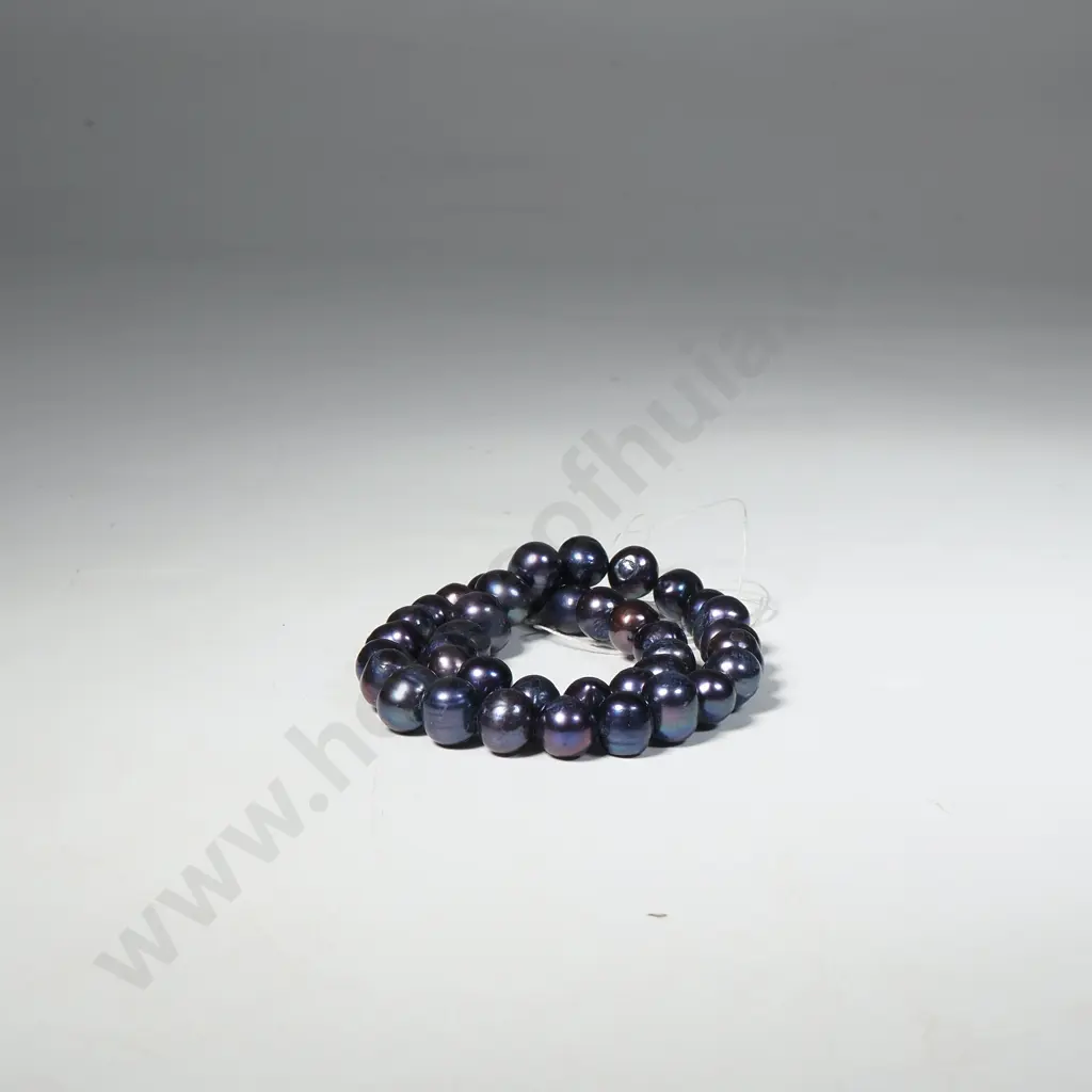 String of Tahitian Pearls Image 1++