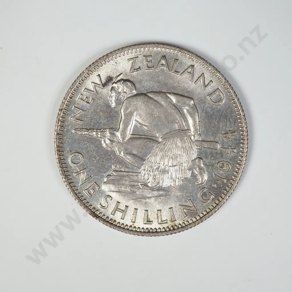 1944 ONE SHILLING, A.UNC ( OBVERSE STAIN ), C.V. $175 Image 1++
