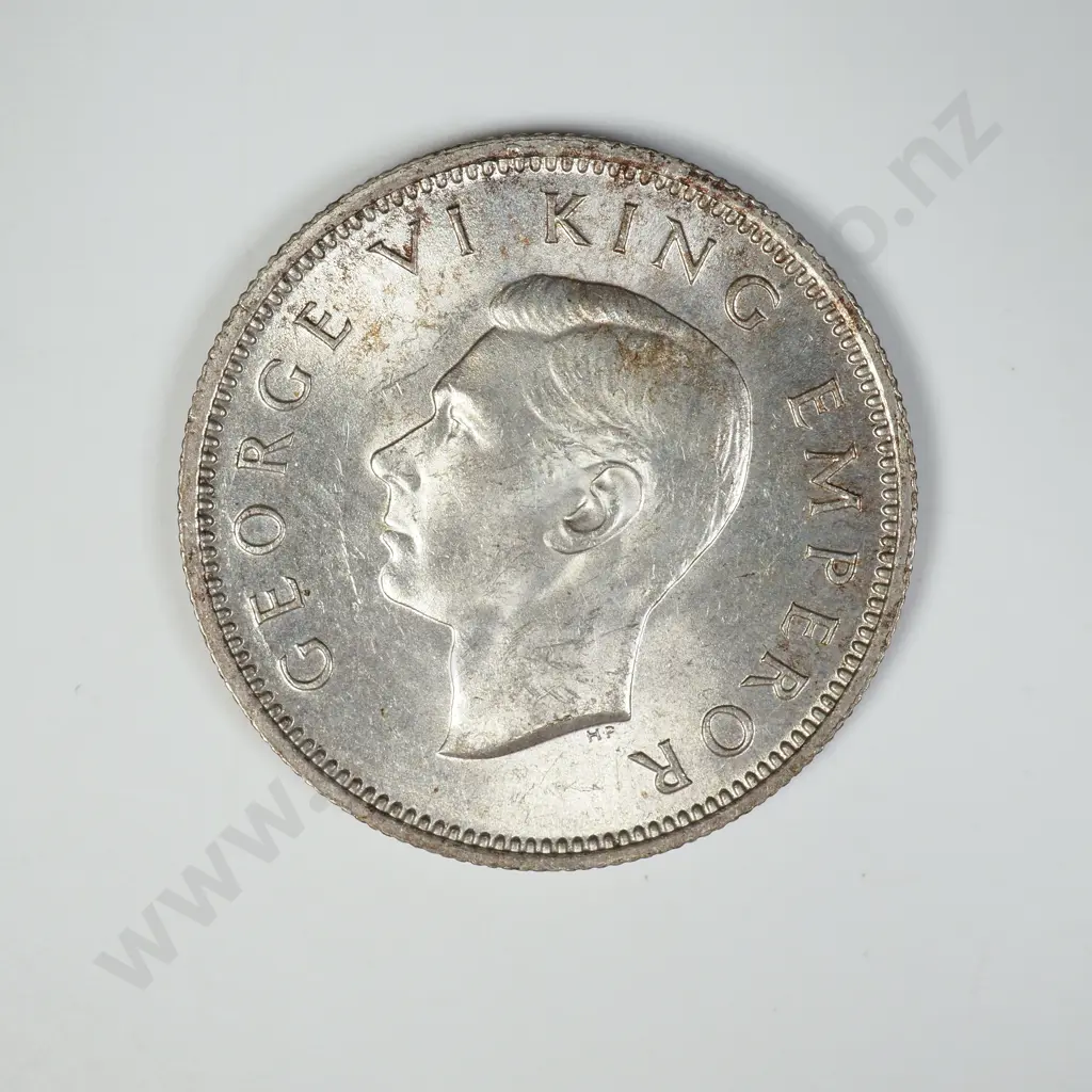 1944 ONE SHILLING, A.UNC ( OBVERSE STAIN ), C.V. $175 Image 1++