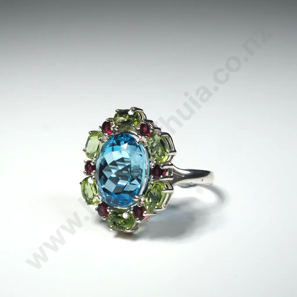 Sterling Silver Blue Topaz, Peridots and Garnet Ring Image 1++