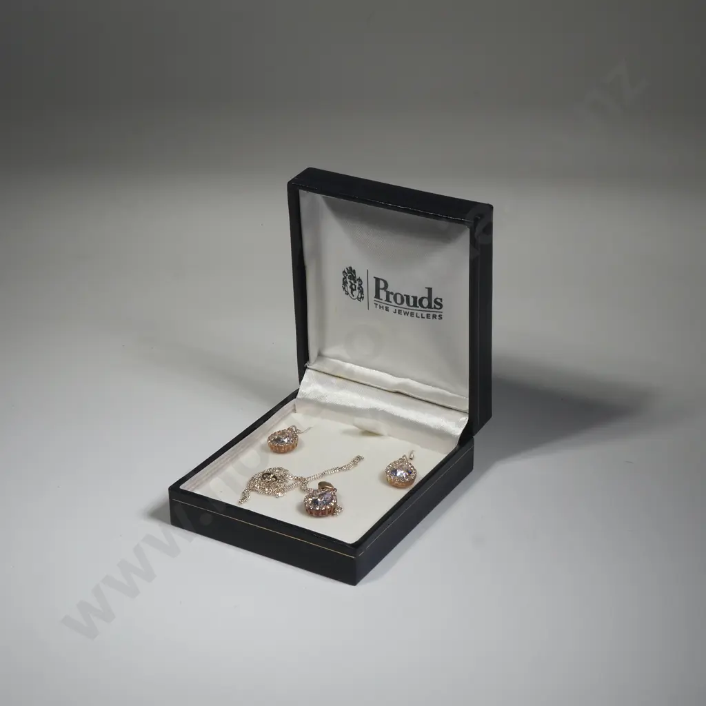 Prouds Box Containing Pear Shaped White Stone Earrings And Matching Pendant Image 1++