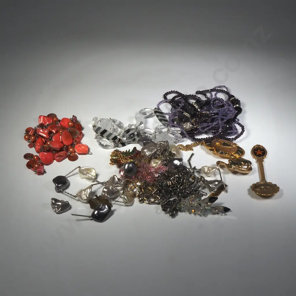 A Bag Of Mainly Costume Necklaces Broaches And A souvenir Spoon of Hollywood Image 1++
