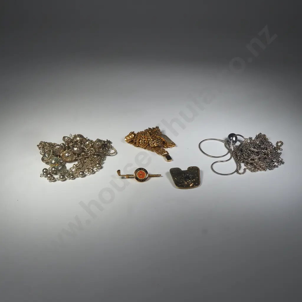 A Bag Of Silver And Gold Tone Jewellery Includes Necklaces And Brooch Image 1++