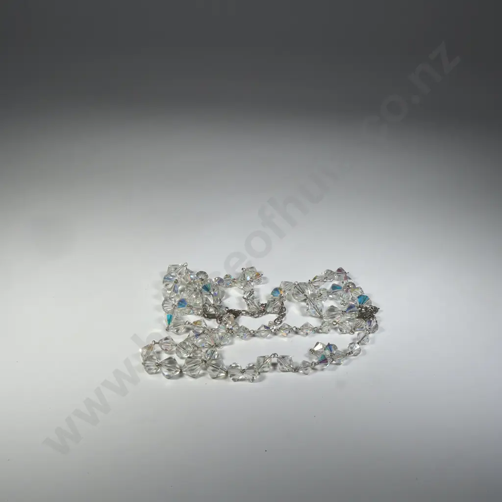 A Triple String Of Facetted Crystal Beads Image 1++