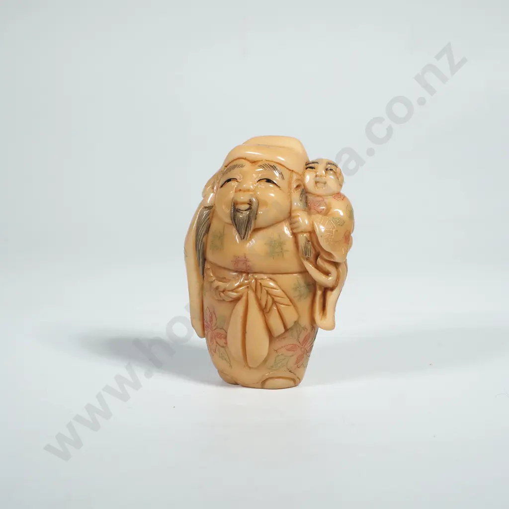 Carved Tagua Nut Netsuke Depicting Hotei  Holding a Child Image 1++