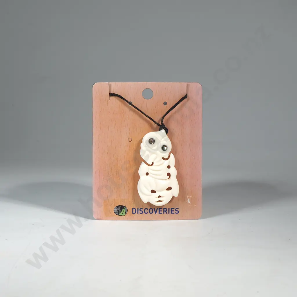 Carved Bone Tiki Pendant on Cord Image 1++