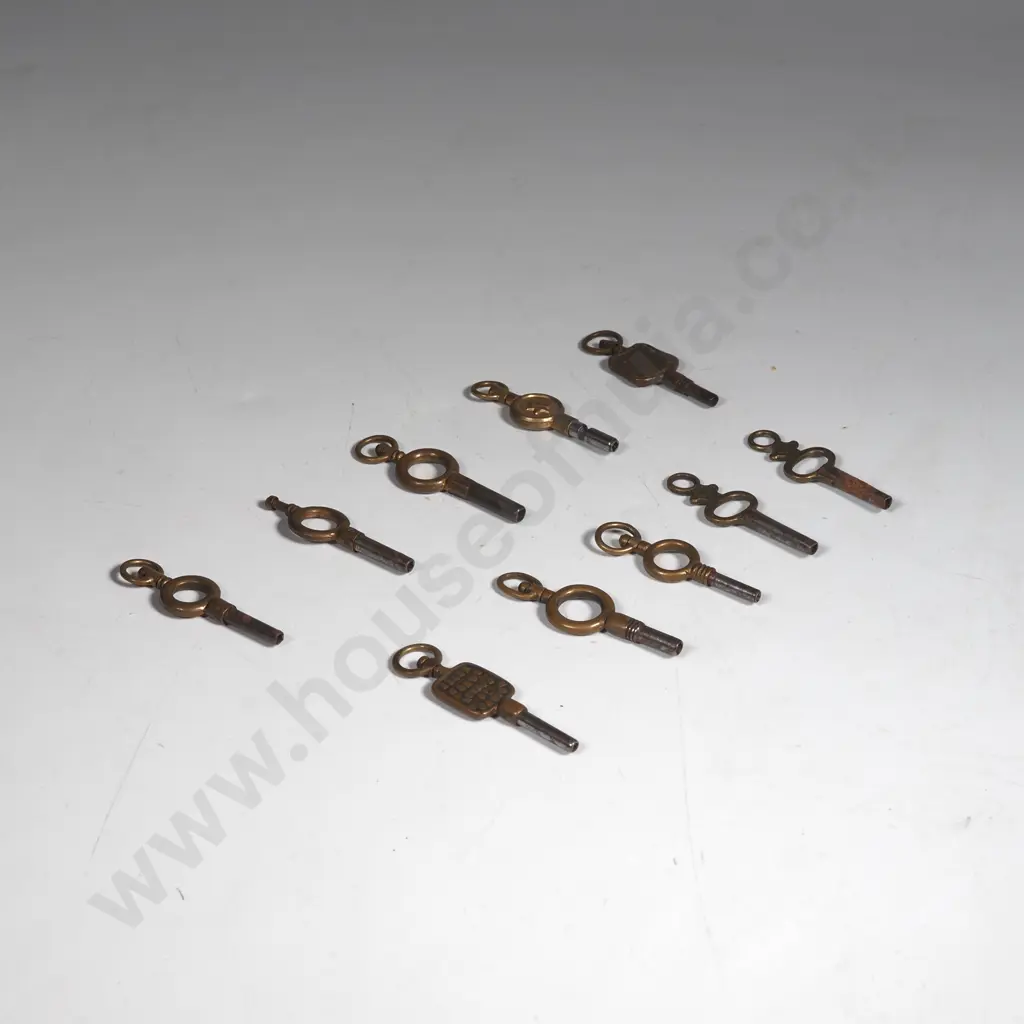 Ten Small Pocket Watch Keys including one Marked ' J Neilsen Waimate' & ' Allen Adams London & Norwich' Image 1++