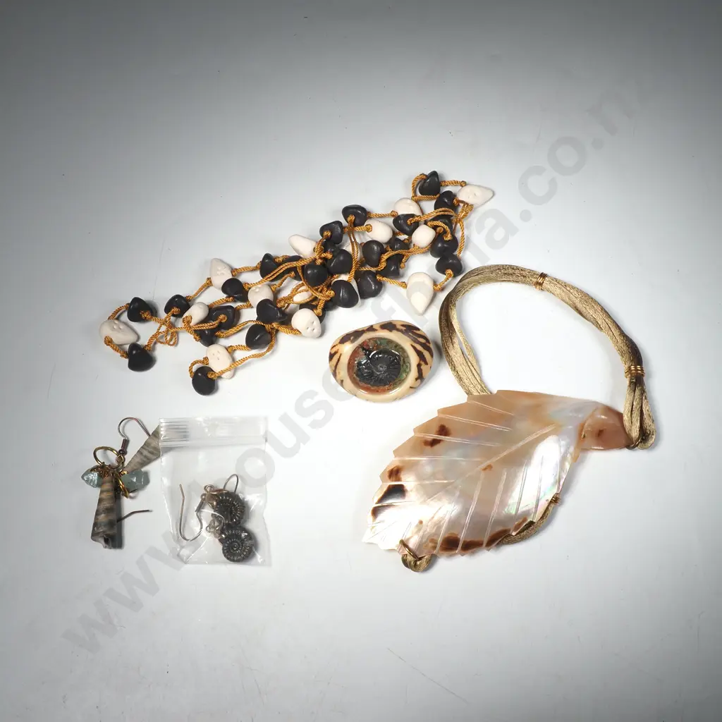 Necklace w Alternating White & Black Small Stone on a Golden Coloured Cord & a Mother of Pearl Leaf Shaped Pendant Image 1++