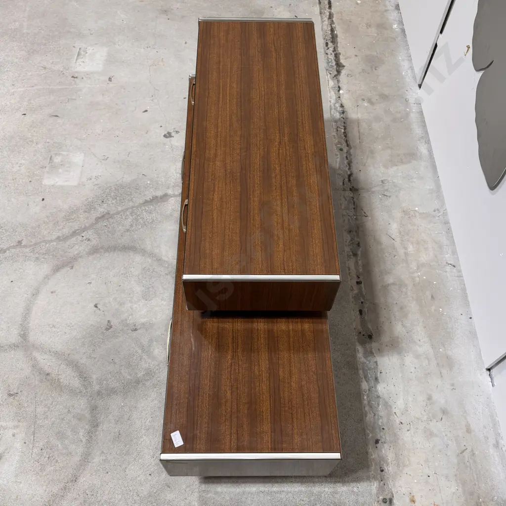 Vintage Retro Wood Grain Assymetrical Laminate Buffet w Metal Trim & Handles Resting on Square Tapered Legs Image 1++