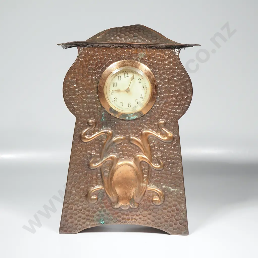 Arts & Crafts Hammered Copper Mantel  Clock Featuring Embossed Art Nouveau Decoration Below a Round Dial Image 1++